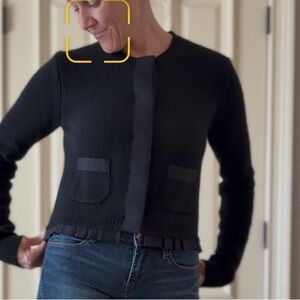 Zara Black Knit cashmere Sweater with ruffle and snap button detail.